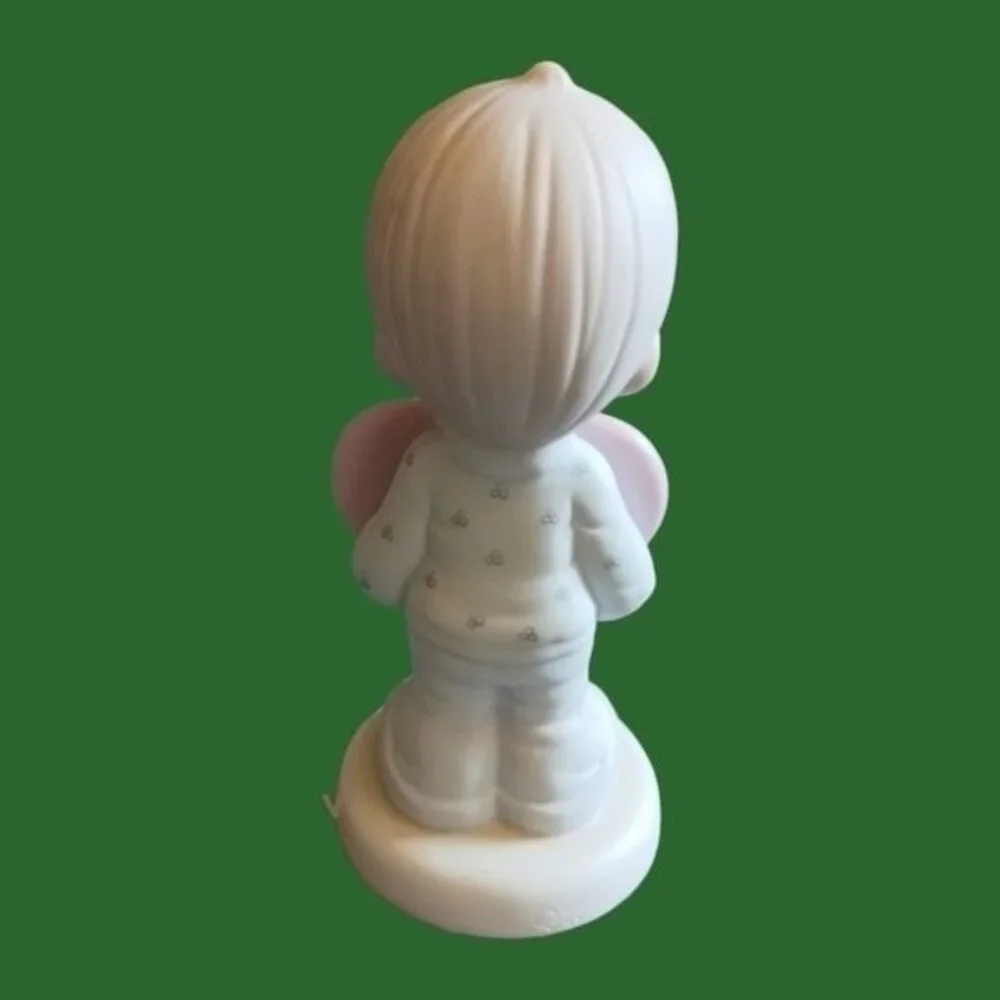 Precious moments figurine aboy holder broken heart